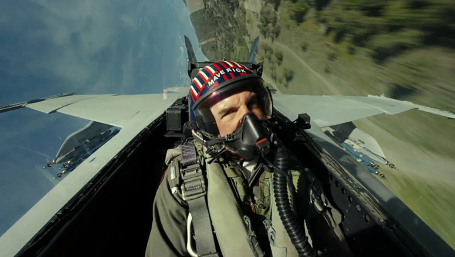 A different image of Tom Cruise in a fighter jet in TOP GUN: MAVERICK.