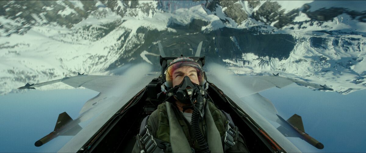 Tom Cruise flies upside-down in TOP GUN: MAVERICK.