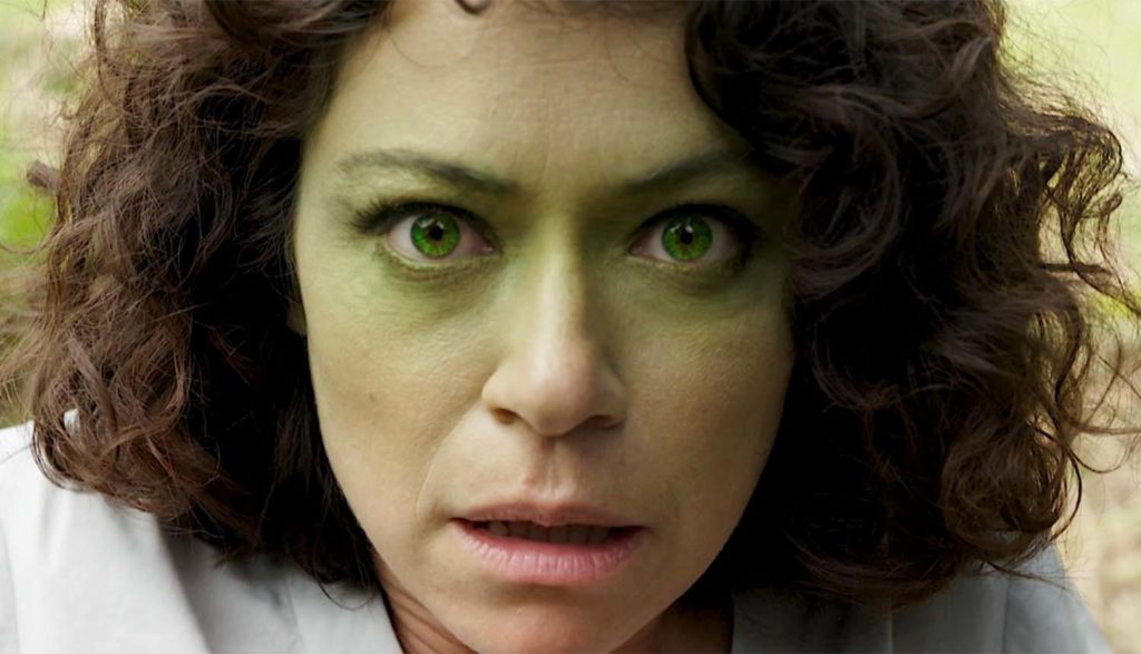 Tatiana Maslany gets a little green around the face in a still from SHE-HULK: ATTORNEY AT LAW.