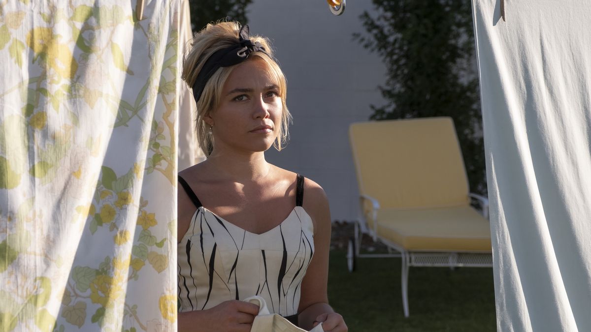 Florence Pugh expresses concern over her laundry in a still from DON'T WORRY DARLING.