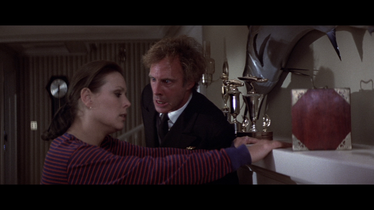 Bruce Dern gets all veiny at Marthe Keller in a still from BLACK SUNDAY.